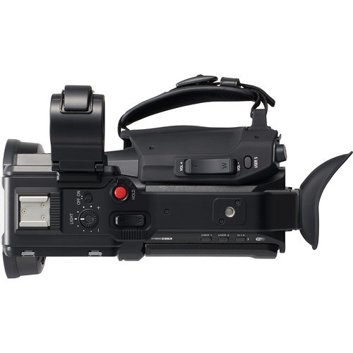 Side view of the Panasonic HC-X2000 UHD Camcorder, showing the battery slot and buttons used in studio productions.Side view of the Panasonic HC-X2000 UHD Camcorder, showing the battery slot and buttons used in studio productions.