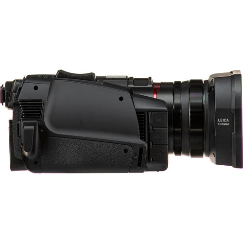 Side view of the Panasonic HC-X2000 4K professional camcorder, showing the grip and controls, ideal for studio productions.