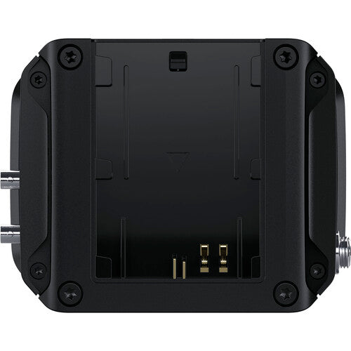 The rear view of the Blackmagic Micro Studio Camera 4K shows the battery mounting plate with gold-plated connectors.